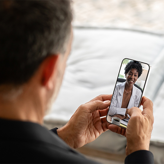 man video calling a doctor