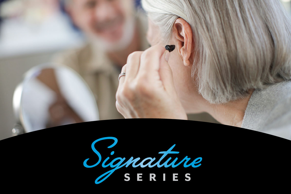 Signature series hearing aids on woman